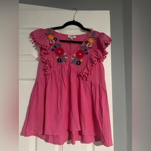 Floral embroidery top with pom-poms
